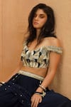Buy_Sva By Sonam & Paras Modi_Blue Crepe Sequins, Beads Scoop Neck Embellished Bustier And Pleated Lehenga Set _Online_at_Aza_Fashions