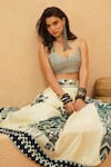 Sva By Sonam & Paras Modi_Silver Crepe Sequins Sweetheart Neck Pleated Lehenga With Metallic Bustier _at_Aza_Fashions