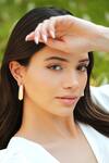 Buy_Varnika Arora_Gold Plated Helixa White Enamel Hoops _at_Aza_Fashions