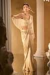 Buy_Aariyana Couture_Gold Crepe Sequins, Embroidery Sweetheart Neck, Pre-draped Saree With Blouse _Online_at_Aza_Fashions