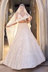 Buy_Seema Gujral_Ivory Net Sequins, Embroidery V-neck Floral Lehenga Set _at_Aza_Fashions