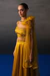 Angad Singh_Mustard Satin, Silk Sequins, Beads, Embroidery Round Neck Festive Lehenga Set _at_Aza_Fashions