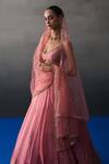 Angad Singh_Peach Brocade Sequins, Zari Round Neck Gajri Banarasi Festive Lehenga Set _Online_at_Aza_Fashions