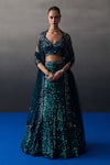 Buy_Angad Singh_Peach Sequins V-neck Peacock Blue Lehenga Set _at_Aza_Fashions