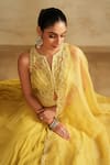 Saisha Yellow Georgette, Organza Sequins, Embroidery Round Neck Lemon Lehenga Set at Aza Fashions Saisha_Yellow Georgette, Organza Sequins, Embroidery Round Neck Lemon Lehenga Set _at_Aza_Fashions