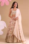 Buy_Samyukta Singhania_Off White Chiffon, Silk, Tissue Embroidery Round Neck Floral Hand Lehenga Set _at_Aza_Fashions