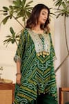Shop_Sonali Methi_Green Chinon, Crepe Tassels Round Neck, Keyhole Bottle Designer Kurta Dhoti Set _at_Aza_Fashions