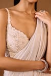 Niamh By Kriti_Ivory Net Sequins, Pearls Round Neck Embellished Pre-draped Saree Set _at_Aza_Fashions