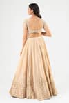 Shop_Amrood_Beige Silk Embroidery, Beads Round Neck Lehenga Set _at_Aza_Fashions