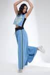 Buy_Krati Jain_Blue Denim Round Neck Funky Motif Crop Top And Flared Pants Set _at_Aza_Fashions