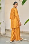 Shop_Vidushi Gupta_Yellow Modal, Silk, Cotton Tassels Round Neck Designer Ochre Kurta Pant Set _at_Aza_Fashions