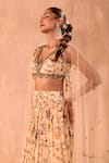 Mehak Murpana X AZA_Ivory Crepe, Net Embroidery, Zari V-neck Floral Print Layered Lehenga Set _Online