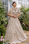 Buy_Tamaraa By Tahani_Beige Silk Crystals, Sequins, Beads, Pearls Nyra Garden Motif Bridal Lehenga Set _at_Aza_Fashions