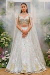 Buy_Tamaraa By Tahani_Blue Net, Silk Crystals, Sequins, Beads, Mirrors Kaira Ice Lehenga Set _at_Aza_Fashions