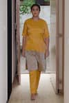 Shop_KAJAL AGRAWAL_Yellow Round Neck Nalini Color Block Kurta And Trouser Set _at_Aza_Fashions