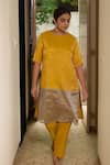 Buy_KAJAL AGRAWAL_Yellow Round Neck Nalini Color Block Kurta And Trouser Set _at_Aza_Fashions