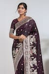 Samyukta Singhania_Wine Pom-poms, Embroidery, Zari V-neck Banarasi Satin Silk Saree With Blouse _at_Aza_Fashions