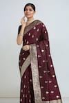 Samyukta Singhania Maroon Tassels, Zari Round Neck Woven Banarasi Saree With Blouse Online at Aza Fashions Samyukta Singhania_Maroon Tassels, Zari Round Neck Woven Banarasi Saree With Blouse _Online_at_Aza_Fashions