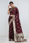 Buy Samyukta Singhania Maroon Tassels, Zari Round Neck Woven Banarasi Saree With Blouse at Aza Fashions Buy_Samyukta Singhania_Maroon Tassels, Zari Round Neck Woven Banarasi Saree With Blouse _at_Aza_Fashions
