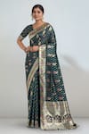 Buy_Samyukta Singhania_Teal Zari V-neck Dark Green Woven Banarasi Saree With Blouse _at_Aza_Fashions
