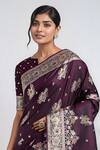 Samyukta Singhania_Wine Tassels, Zari Round Neck Dark Woven Banarasi Saree With Blouse _Online_at_Aza_Fashions