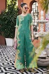 Buy_Saundh_Green Viscose, Crepe Round Neck The Neer Printed Jumpsuit _at_Aza_Fashions