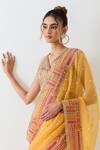 Kavita Bhartia_Mustard Georgette, Tissue Beads V-neck Yellow Saree With Blouse _at_Aza_Fashions