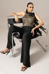 Shop_Namrata Joshipura_Black Georgette Sequins Halter Neck Matrix Box Pleat Jumpsuit _Online_at_Aza_Fashions