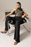Namrata Joshipura_Black Georgette Sequins Halter Neck Matrix Box Pleat Jumpsuit _at_Aza_Fashions