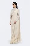 Buy_Onaya_Off White Lycra Cut Work, Sequins, Pre-draped Saree And Embellished Blouse Set _Online_at_Aza_Fashions