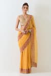 Buy_Kavita Bhartia_Mustard Georgette, Tissue Beads V-neck Yellow Saree With Blouse _at_Aza_Fashions