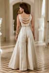 Shop_Paulmi And Harsh_Ivory Brocade Chains Round Neck Jacquard Flared Jumpsuit _at_Aza_Fashions