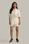 Buy Neetiandmudita Ivory Cotton Sequins Collared Ruffle Glimmer Shorts Co-ord Set at Aza Fashions Buy_Neetiandmudita_Ivory Cotton Sequins Collared Ruffle Glimmer Shorts Co-ord Set _at_Aza_Fashions