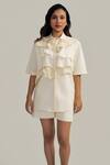 Buy Neetiandmudita Ivory Cotton Sequins Collared Ruffle Glimmer Shorts Co-ord Set Online at Aza Fashions Buy_Neetiandmudita_Ivory Cotton Sequins Collared Ruffle Glimmer Shorts Co-ord Set _Online_at_Aza_Fashions