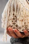Buy_Nayaab By Sonia_White Pearls Raindrops Tassel Potli _Online_at_Aza_Fashions