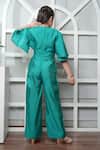 Shop_Jelly Jones_Green Embellished Buckle Jumpsuit_at_Aza_Fashions