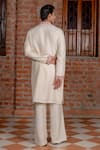 Shop_Nafs_Cream Tussar, Silk Embroidery, Mirrors Ivory Kurta And Flared Pant _at_Aza_Fashions
