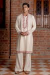 Buy_Nafs_Cream Tussar, Silk Embroidery, Mirrors Ivory Kurta And Flared Pant _at_Aza_Fashions