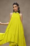 Kyra By Bhavna_Lime Silk, Crepe Sequins Halter Neck Luxe Kurta Set _at_Aza_Fashions