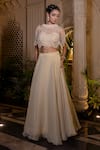 Farha Syed_Ivory Chiffon, Tissue, Taffeta Pearls, Sequins Beige Cape Lehenga Bustier Set _at_Aza_Fashions