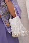 Buy_Plode_White Cut Work, Sequins Cutdana Tassel Embellished Potli _Online_at_Aza_Fashions