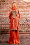 Shop_Nafs_Rust Tussar, Silk Organza Sequins Round Neck Kurta Gharara Set _at_Aza_Fashions