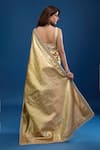Shop_Tarun Tahiliani_Gold Zari Floral Pattern Saree With Unstitched Blouse Piece _at_Aza_Fashions