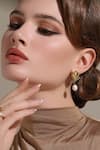 Buy_Dusala_Gold Plated Pearls Geometric Flair Earrings _Online_at_Aza_Fashions