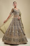 Buy Samyukta Singhania Green Net Embroidery V-neck Tonal Lehenga Set at Aza Fashions Buy_Samyukta Singhania_Green Net Embroidery V-neck Tonal Lehenga Set _at_Aza_Fashions