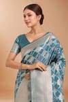 Shop_Samyukta Singhania_Blue Tassels, Zari V-neck Woven Banarasi Satin Silk Saree With Blouse _Online_at_Aza_Fashions