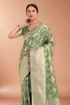 Samyukta Singhania_Green Embroidery, Zari V-neck Woven Banarasi Silk Saree With Blouse _Online_at_Aza_Fashions