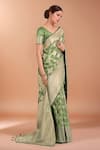 Shop_Samyukta Singhania_Green Embroidery, Zari V-neck Woven Banarasi Silk Saree With Blouse _Online_at_Aza_Fashions