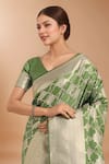 Samyukta Singhania_Green Embroidery, Zari V-neck Woven Banarasi Silk Saree With Blouse _at_Aza_Fashions