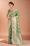Buy_Samyukta Singhania_Green Embroidery, Zari V-neck Woven Banarasi Silk Saree With Blouse _at_Aza_Fashions
